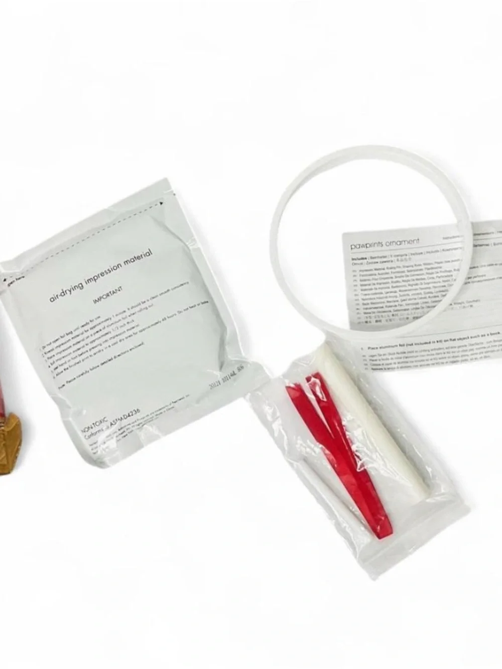 Pearhead Pawprints Ornament Kit in White and Red Accents